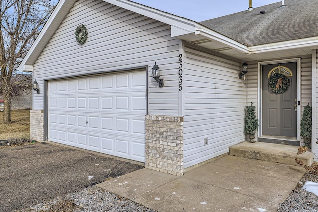 exterior space with a garage