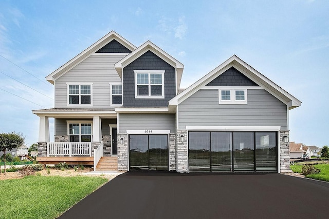 craftsman inspired home featuring a porch