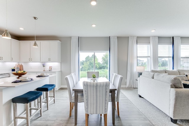 dining room featuring light wood-type flooring