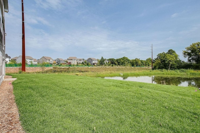 view of yard with a water view