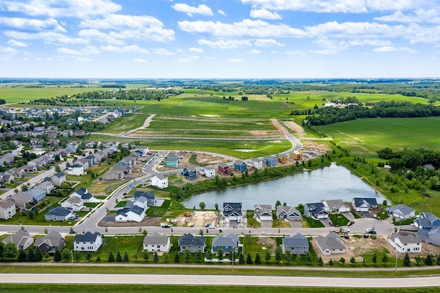 birds eye view of property with a residential view and a water view