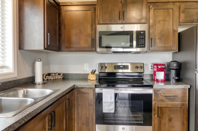 kitchen featuring sink and appliances with stainless steel finishes