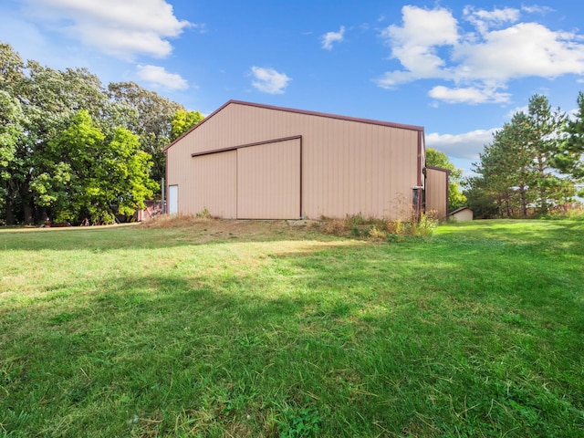 view of outdoor structure featuring a yard