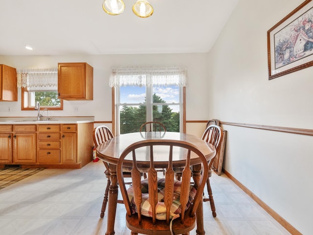 dining space with sink