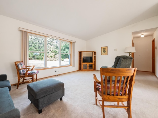 living room with light carpet and lofted ceiling