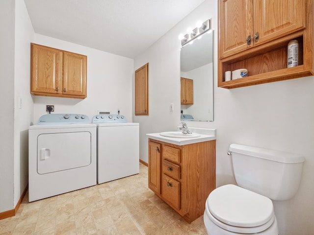 laundry room featuring sink and independent washer and dryer