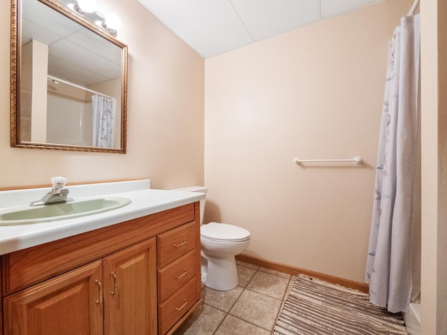 bathroom with walk in shower, tile patterned flooring, vanity, and toilet