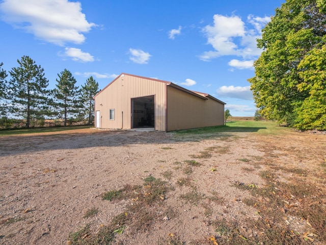 view of outbuilding with a garage