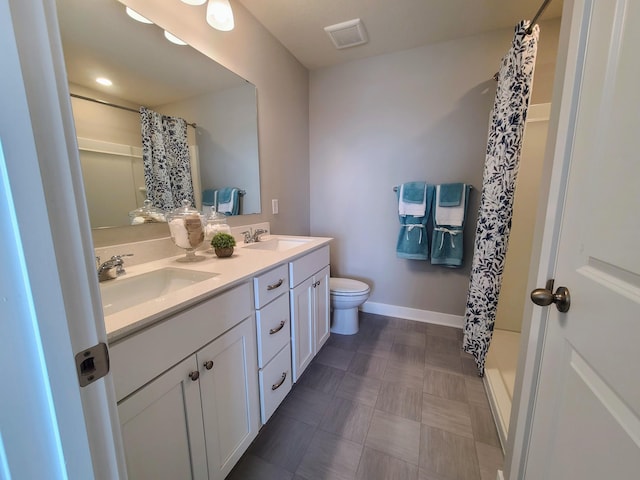 bathroom with a shower with curtain, vanity, and toilet