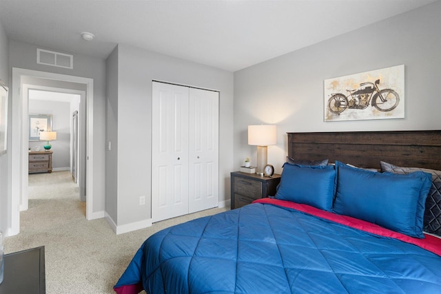 carpeted bedroom with a closet