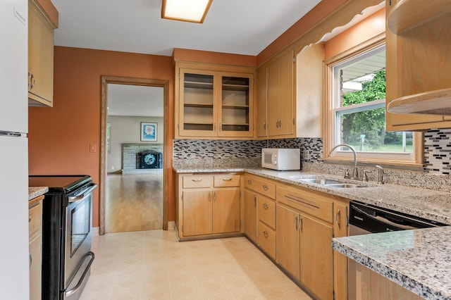 4700 Glenwood Ave, Golden Valley, MN 55422 - kitchen featuring white appliances, backsplash, light stone countertops, and glass insert cabinets