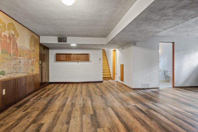 4700 Glenwood Ave, Golden Valley, MN 55422 - unfurnished room featuring wood finished floors and stairs