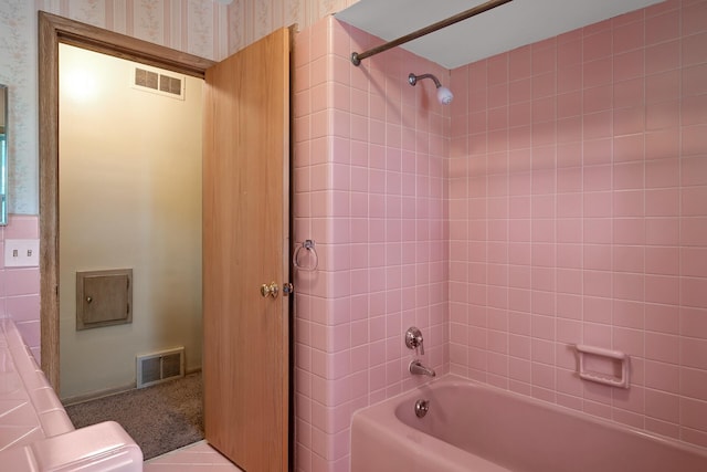 4700 Glenwood Ave, Golden Valley, MN 55422 - bathroom featuring wallpapered walls and shower / bathtub combination