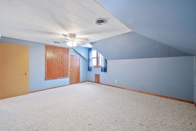 bonus room with carpet, ceiling fan, and lofted ceiling