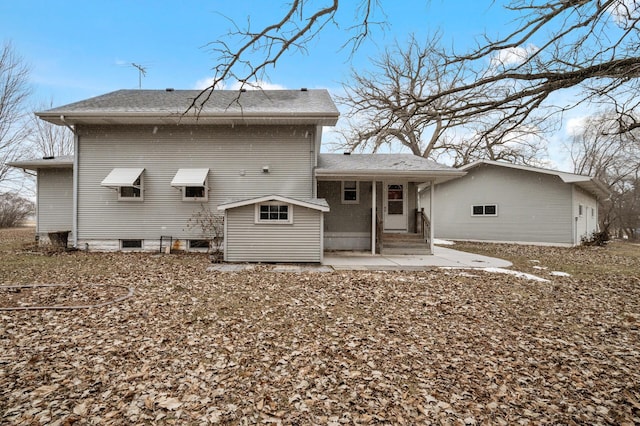 back of property featuring a patio area