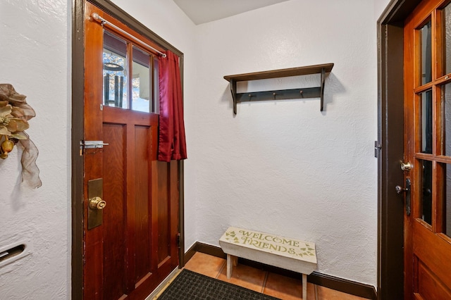 mudroom with tile patterned flooring