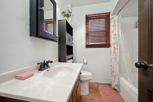 full bathroom with tile patterned floors, vanity, toilet, and shower / bathtub combination with curtain