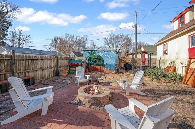 view of patio featuring an outdoor fire pit