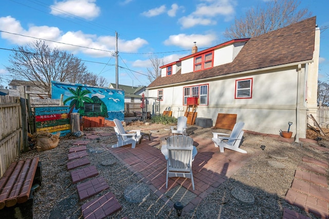 view of patio with an outdoor fire pit