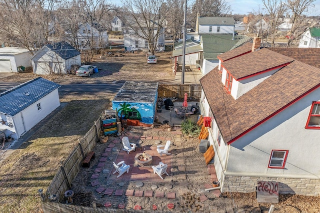 view of yard with a patio and an outdoor fire pit