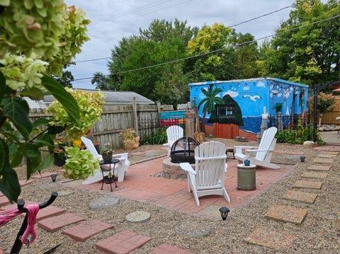 view of patio / terrace featuring a fire pit