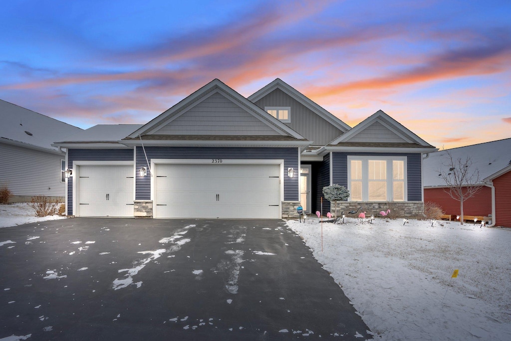 craftsman-style house featuring a garage