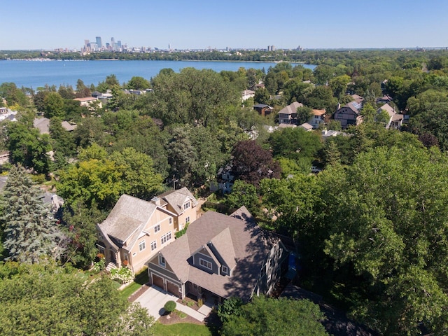 birds eye view of property featuring a water view