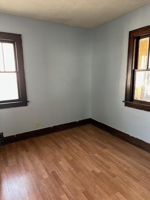 empty room with light wood-type flooring