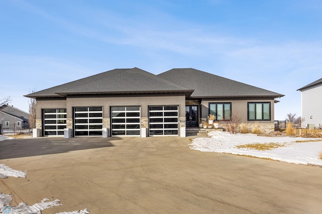 prairie-style home with a garage