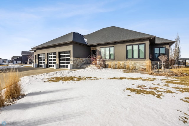 prairie-style home with a garage