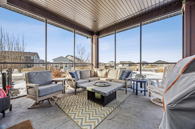 sunroom / solarium with plenty of natural light