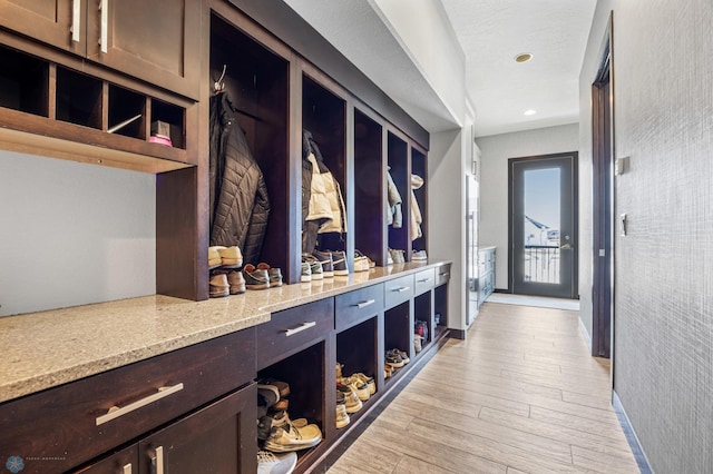 mudroom with light wood-type flooring