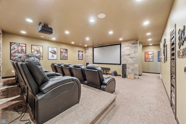 home theater room featuring light carpet