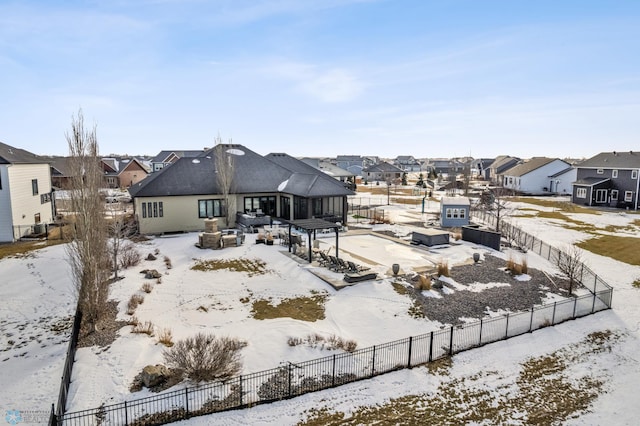 view of snow covered property