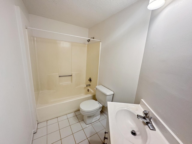 full bathroom with sink, shower / tub combination, tile patterned flooring, a textured ceiling, and toilet