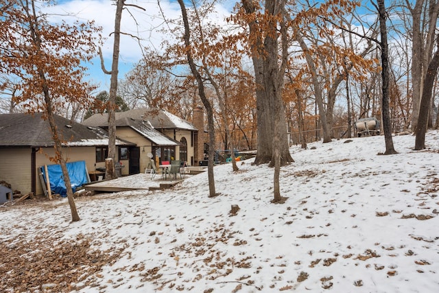 view of yard covered in snow