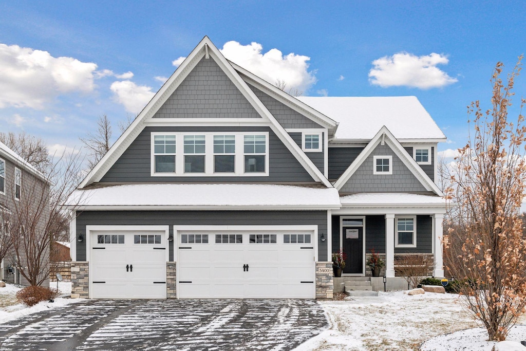 craftsman house with a garage