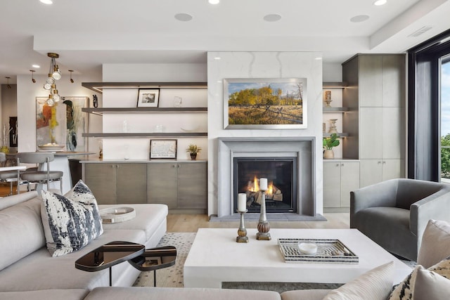 living room with light hardwood / wood-style floors