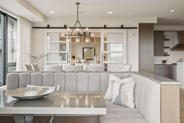 dining area with a barn door