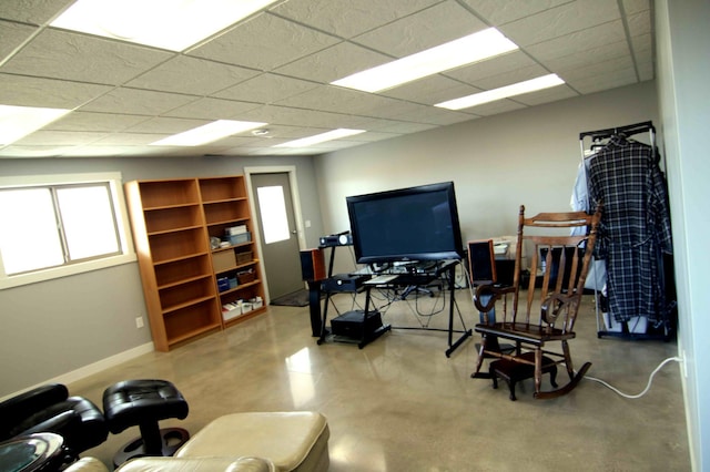 workout room featuring a paneled ceiling