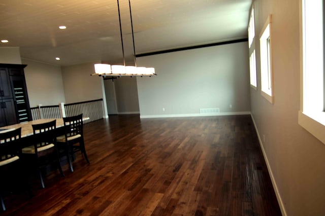 dining room featuring dark wood-type flooring