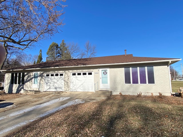 ranch-style home with a garage