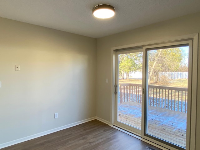 entryway with dark hardwood / wood-style floors