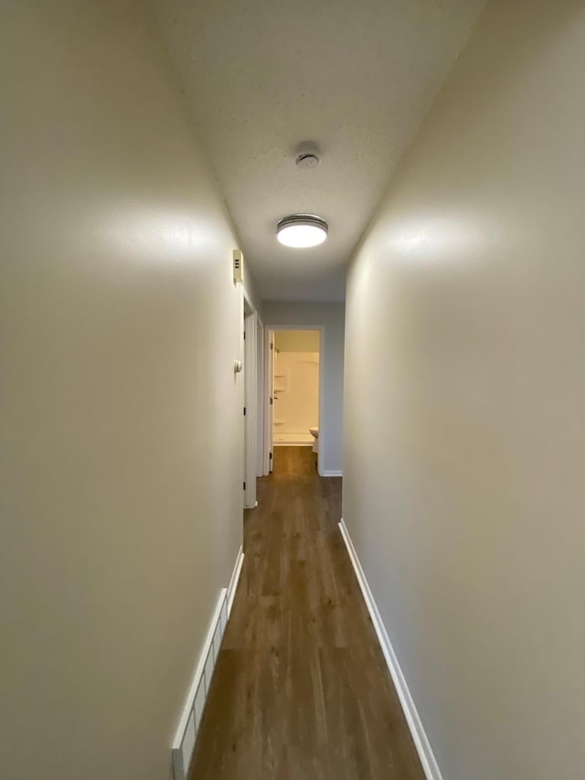 hall featuring dark hardwood / wood-style flooring