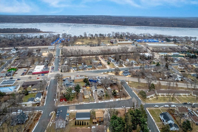 bird's eye view with a water view