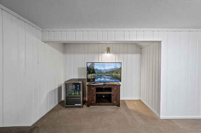 carpeted living room with wine cooler