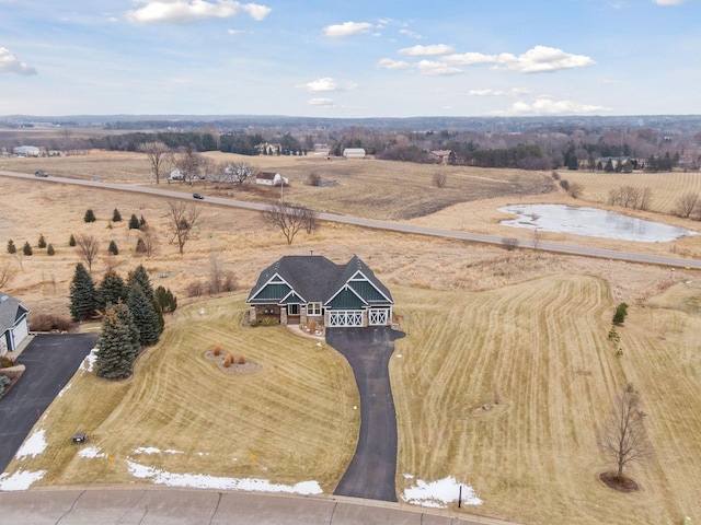 birds eye view of property featuring a rural view