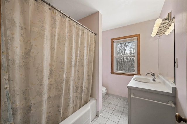 bathroom with vanity, tile patterned floors, and toilet