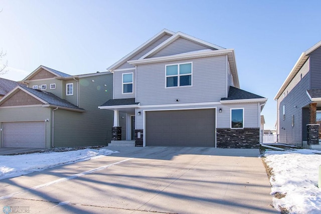 craftsman house featuring a garage