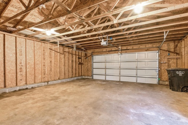 garage featuring a garage door opener